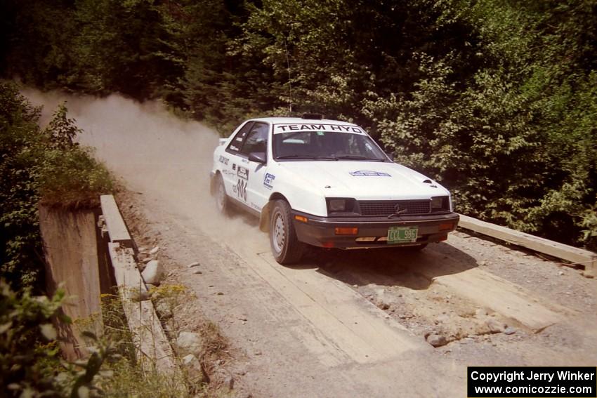 John Carrara / Philip Ho Dodge Shadow at speed over a bridge on SS5, Magalloway North.