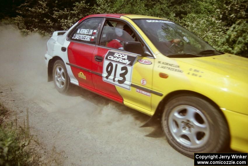 Janusz Jastrzebski / Marcin Korneluk Subaru Impreza at speed over a bridge on SS5, Magalloway North.