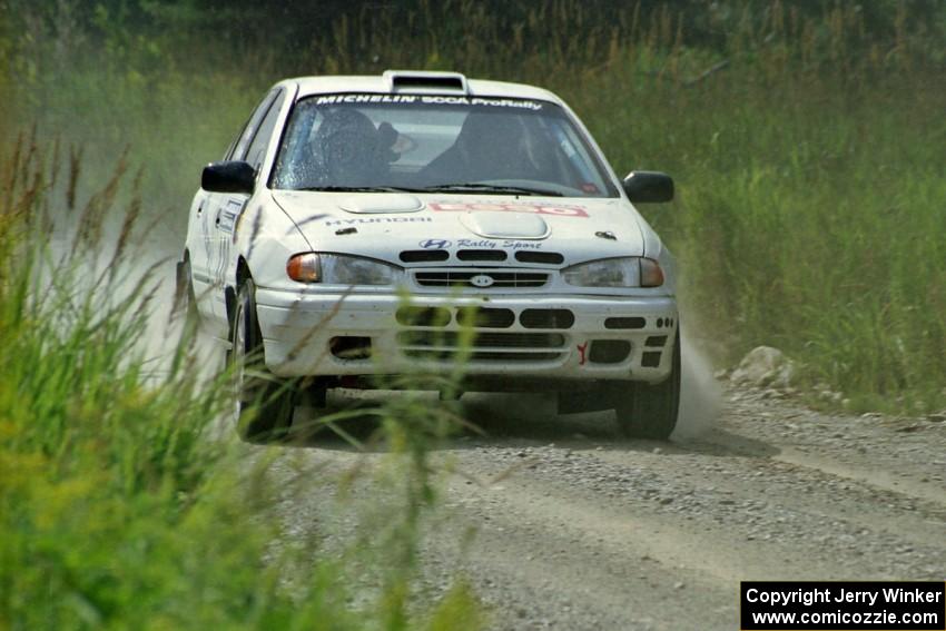 Dean Panton / Michael Fennell Hyundai Elantra at speed on SS8, Parmachenee Long.