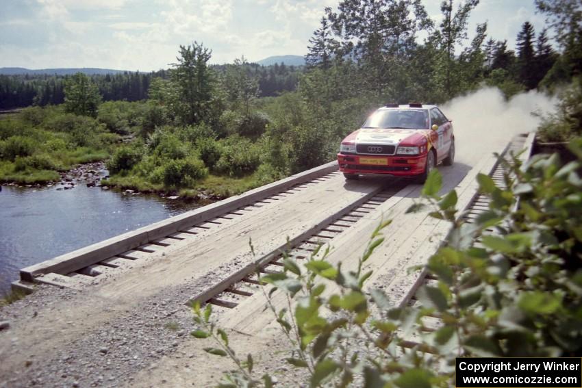 John Rek / Constantine Mantopoulos Audi S2 Quattro at speed over a bridge on SS8, Parmachenee Long.