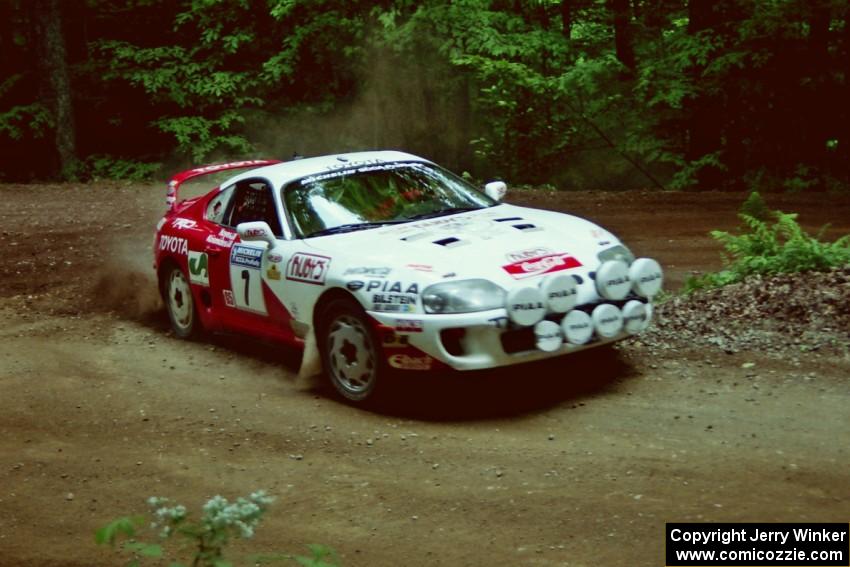 Ralph Kosmides / Joe Noyes Toyota Supra Turbo powers out of a hairpin on SS5, Thompson Point I.