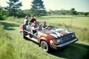 Mark Utecht drives his Omni-Mok around the property. J.B. Niday is his passenger on the right-side.