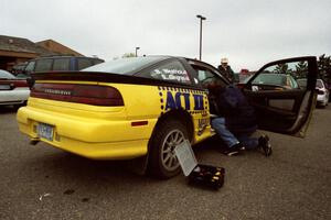 Steve Gingras / Mark Lietha get their Mitsubishi Eclipse GSX through the tech line.