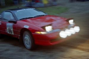 The Mark Larson / Kelly Cox Eagle Talon drifts through the sweeper at the crossroads spectator location.