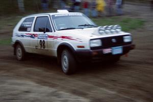 Bob Nielsen / Brett Corneliusen at speed in their VW Golf at the crossroads spectator location.