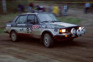 The VW Jetta GL of Eric Schroeder / Jeff Secor drifts past spectators at the crossroads.