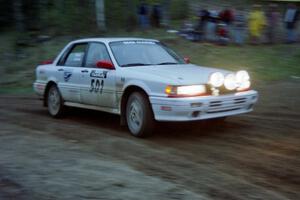 The Todd Jarvey / Rich Faber Mitsubishi Galant VR-4 goes through the sweeper at the crossroads.