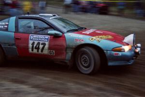 Darek Bosek / Mariusz Malik drift their Eagle Talon through a sweeper at the crossroads.