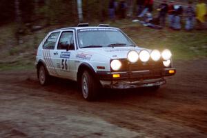 The Doug Davenport / Al Kintigh VW Golf drifts past the spectator location at the crossroads.