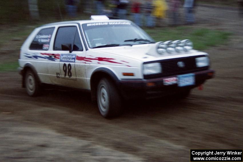 Bob Nielsen / Brett Corneliusen at speed in their VW Golf at the crossroads spectator location.