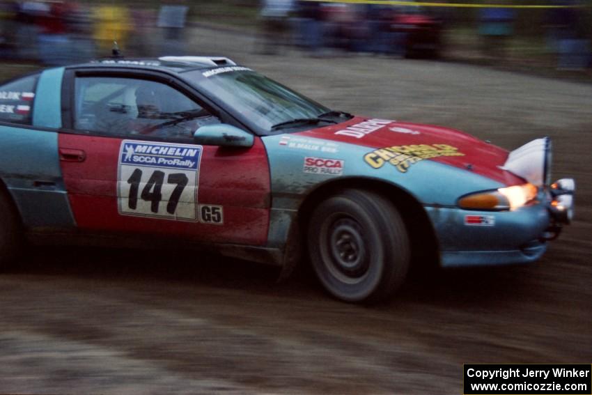 Darek Bosek / Mariusz Malik drift their Eagle Talon through a sweeper at the crossroads.