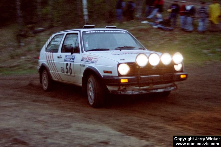 The Doug Davenport / Al Kintigh VW Golf drifts past the spectator location at the crossroads.