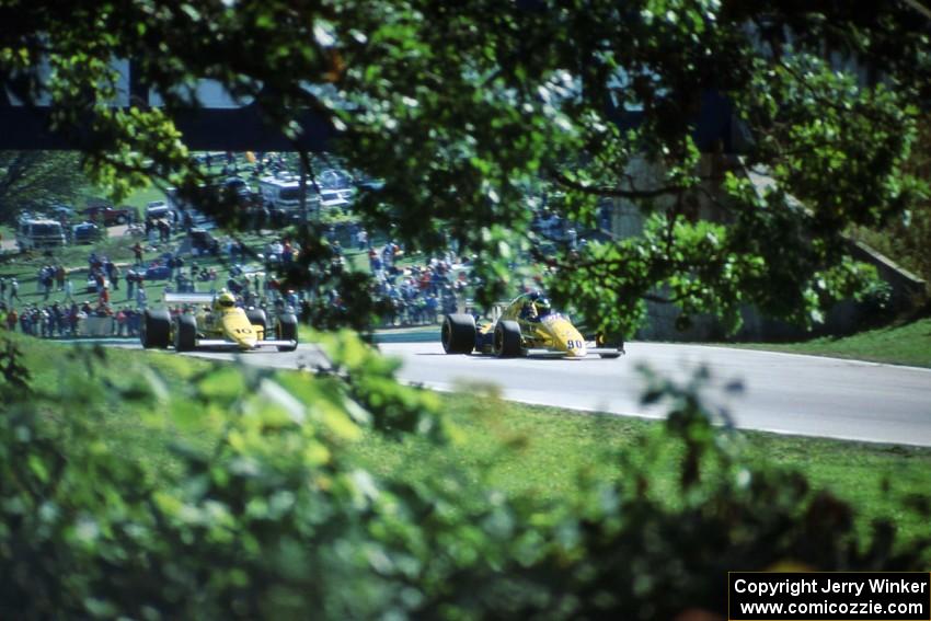 Paul Tracy's March 86A/Buick passes E.J. Lenzi's similar car at turn 6