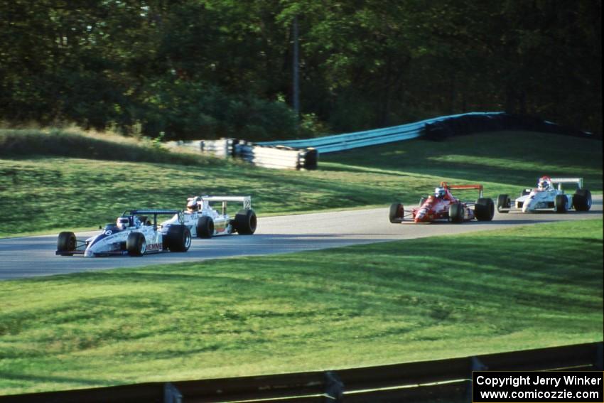 The field gets a yellow mid-way through the race.