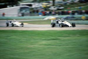 Stuart Crow's Ralt RT-5 puts a lap on Chris Schneider's Ralt RT-5