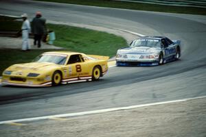 Les Lindley's Chevy Camaro and Ron Fellows' Ford Mustang