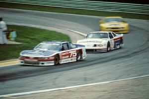 Paul Newman's Olds Cutlass Supreme, Wayne Akers' Ford Mustang and Randy Ruhlman's Chevy Beretta
