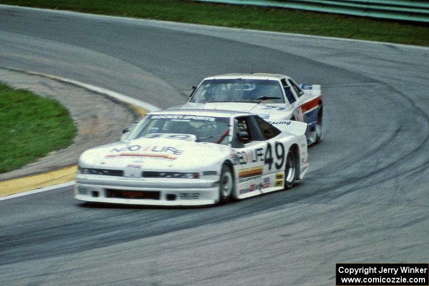 Jerry Brassfield's Olds Cutlass Supreme and Wayne Akers' Ford Mustang