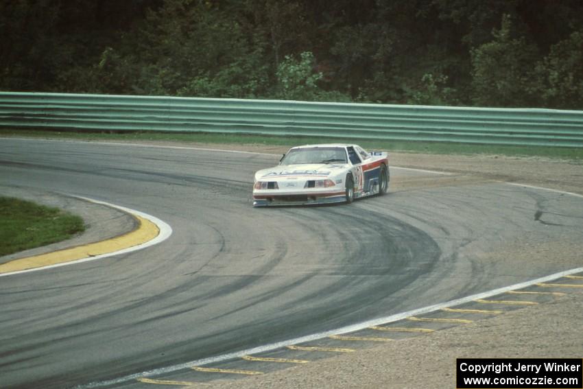 Wayne Akers' Ford Mustang nearly loses it in the downpour