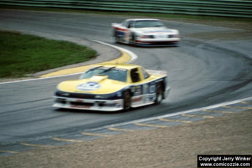 Tommy Kendall's Chevy Beretta and Wayne Akers' Ford Mustang