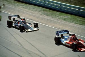 Arie Luyendyk's Lola T-90/00/Chevy ahead of Mario Andretti's Lola T-90/00/Chevy