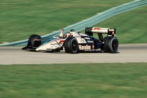 Michael Andretti's Lola T-90/00/Chevy takes the victory.