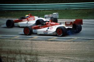 Didier Theys' Lola T-90/00/Cosworth DFS loses an oil line on the pace lap as Jeff Wood's Lola T-91/00/Cosworth DFS passes
