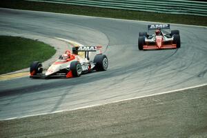 Tony Bettenhausen, Jr.'s Penske PC-19/Chevy and Randy Lewis' Lola T-90/00/Cosworth DFS