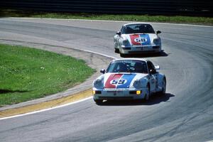 Hurley Haywood's and Don Knowles' Porsche 911 Turbos