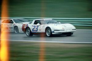 Jay Sperry's Chevy Corvette stays ahead of Bo Lemler's Lotus Esprit X180R