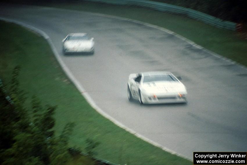 Paul Newman's Lotus Esprit X180R ahead of Jay Sperry's Chevy Corvette