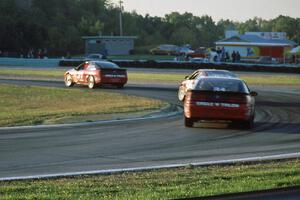 Tommy Archer's Eagle Talon ahead of Norris Rancort's Honda CRX Si and Mitch Wright's Eagle Talon