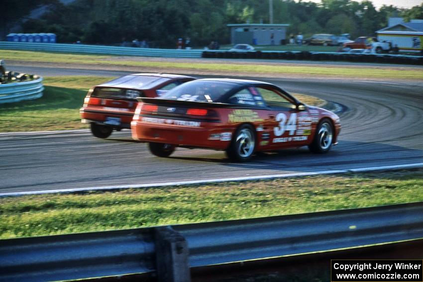 Norris Rancort's Honda CRX Si and Mitch Wright's Eagle Talon battle