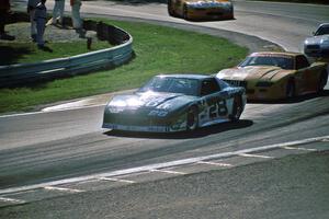 Jack Baldwin's Chevy Camaro ahead of Les Lindley's Chevy Camaro