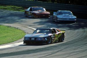 Phil Bartelt's Ford Mustang, Mitch Bender's Olds Cutlass Supreme and Don Sak's Olds Cutlass Supreme