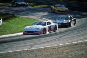 Steve Petty's Chevy Camaro and Irv Hoerr's Olds Cutlass Supreme ahead of the Chevy Camaros of Les Lindley and Jack Baldwin