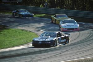 Irv Hoerr's Olds Cutlass Supreme ahead of the Chevy Camaros of Steve Petty, Les Lindley and Jack Baldwin