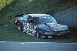 Darin Brassfield's Olds Cutlass Supreme, demolished after hitting the turn 13 bridge