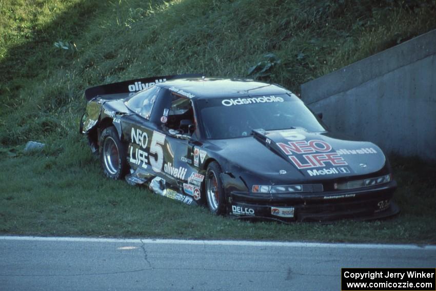 Darin Brassfield's Olds Cutlass Supreme, demolished after hitting the turn 13 bridge