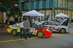 The Andy Pinker / Robbie Durant Subaru WRX STi and the Kenny Bartram / Dennis Hotson Subaru Impreza L Coupe on the Nicollet Mall