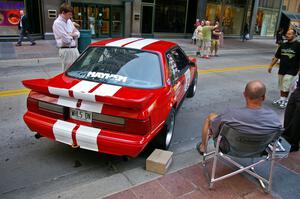 Mark Utecht relaxes next to the Ford Mustang he and Rob Bohn shared (2).