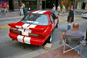 Mark Utecht relaxes next to the Ford Mustang he and Rob Bohn shared (3).