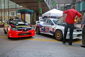 The Andy Pinker / Robbie Durant Subaru WRX STi and Kenny Bartram / Dennis Hotson Subaru Impreza L Coupe on the Nicollet Mall.