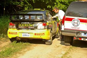 The Andy Pinker / Robbie Durant Subaru WRX STi checks in with Paul Ahles at the start of the practice stage.