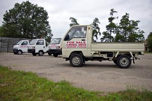 Honda, Mitsubishi and Kawasaki mini-pickups for sale just outside of downtown Bemidji.