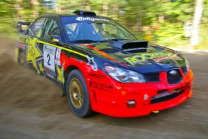 Andy Pinker / Robbie Durant drift beautifully through a right-hander on SS2 in their Subaru WRX STi.