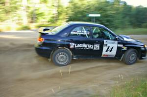 Amy BeberVanzo / Ole Holter drift their Subaru WRX nicely through a right-hander on SS2.