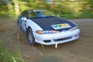 Adam Markut / Chris Gordon drift through a right-hander on SS2 in their Eagle Talon.