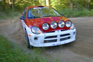 Doug Shepherd / Karen Wagner beautifully apex a right-hander on SS2 in their Dodge SRT-4.