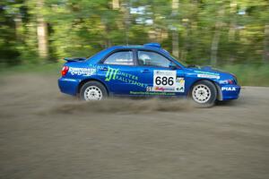 Heath Nunnemacher / Kim DeMotte lock up the brakes on their Subaru WRX at a right-hander on SS2.